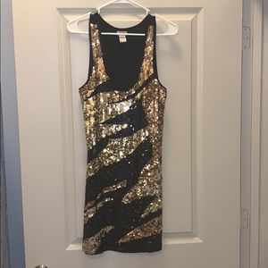 Black and gold sequin dress